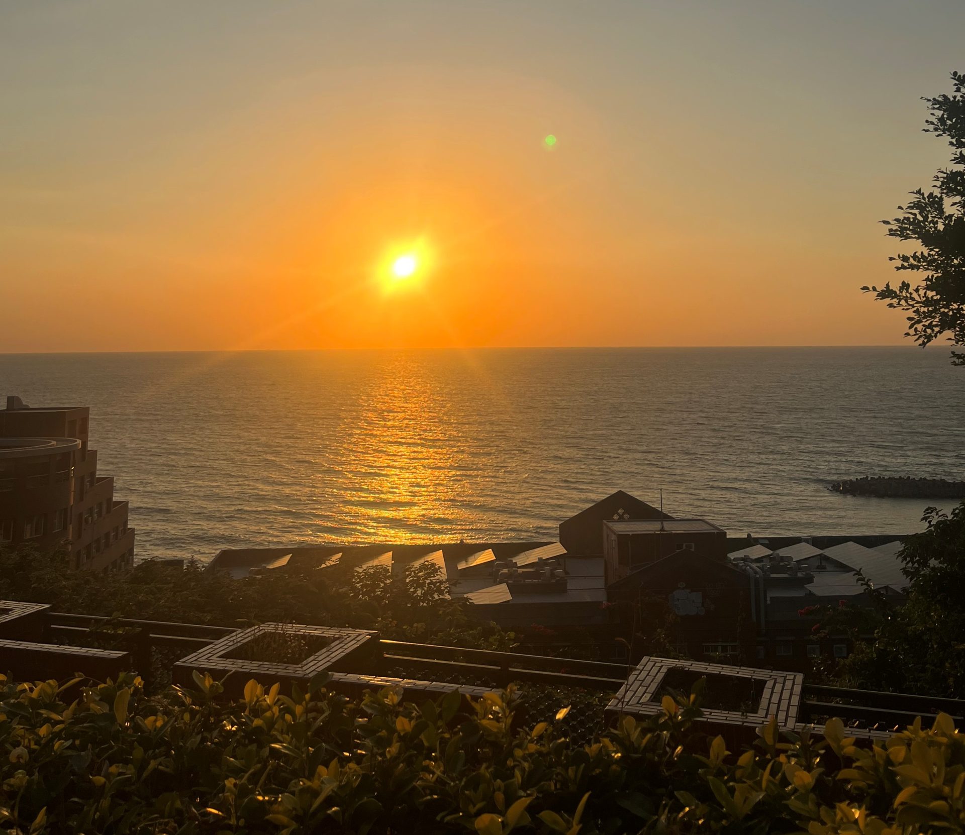 Sunset over the sea seen from the NSYSU campus